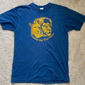 80’s vintage shirt Trackin’ for the Lions Med